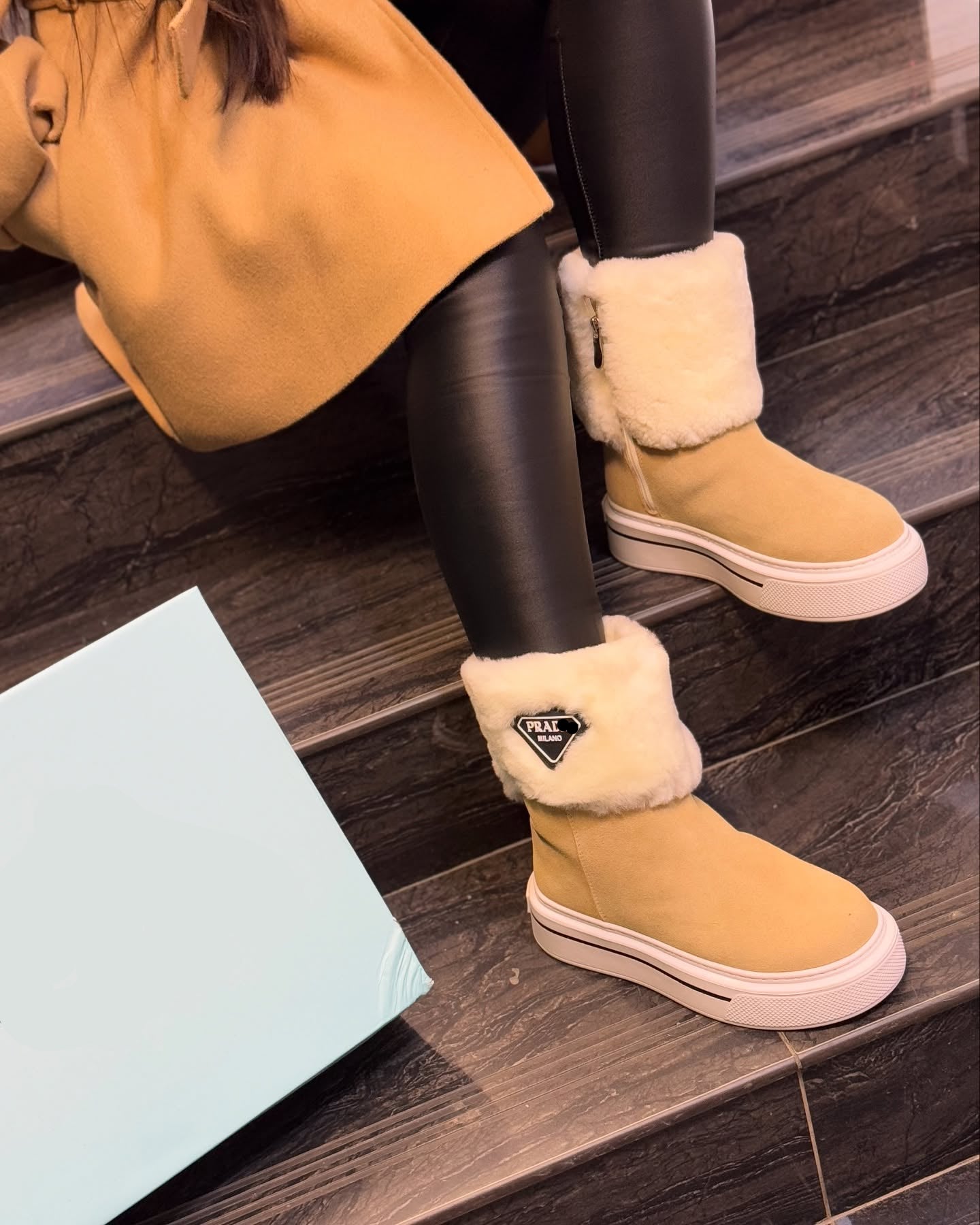 Shearling and leather ankle boots