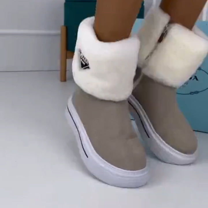 Shearling and leather ankle boots