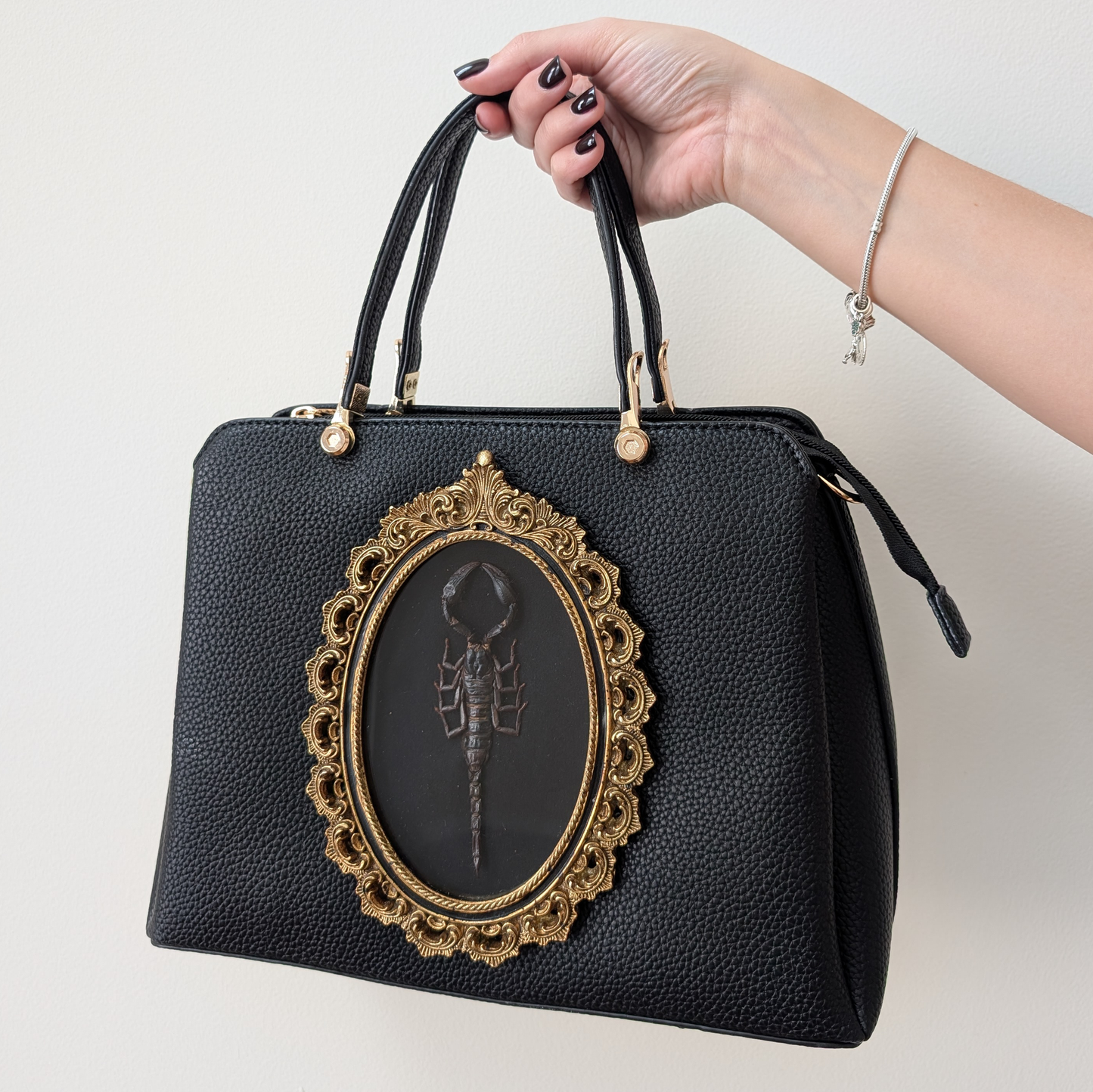 Peacock leather handbag