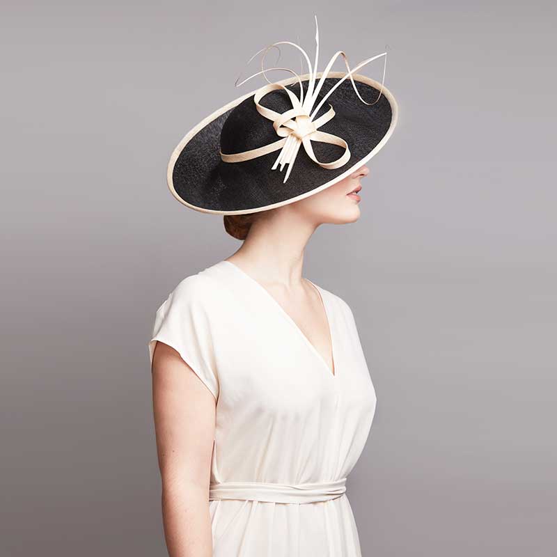 Black and natural sidesweep with feathers and quills