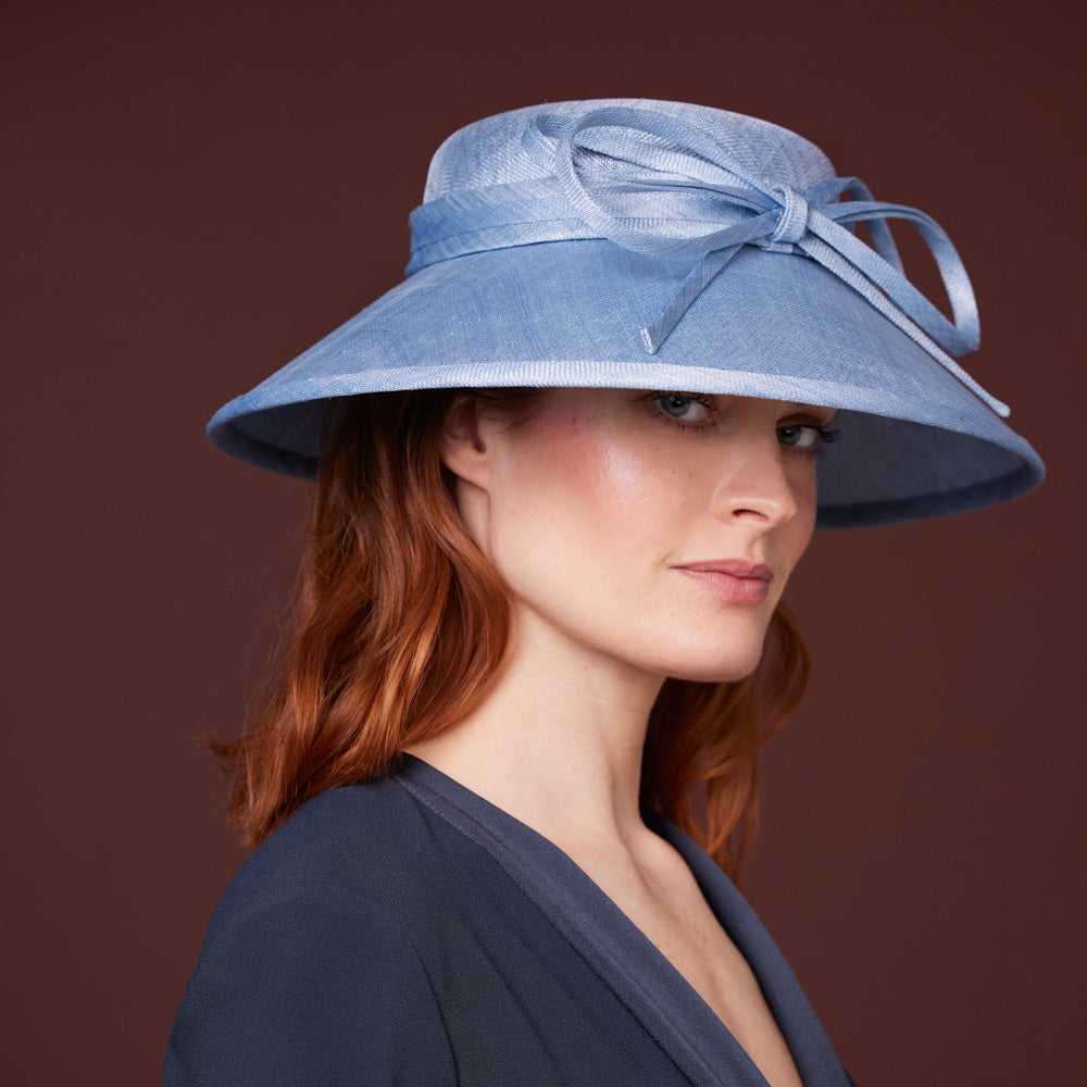 Light blue fine straw downbrim with bow