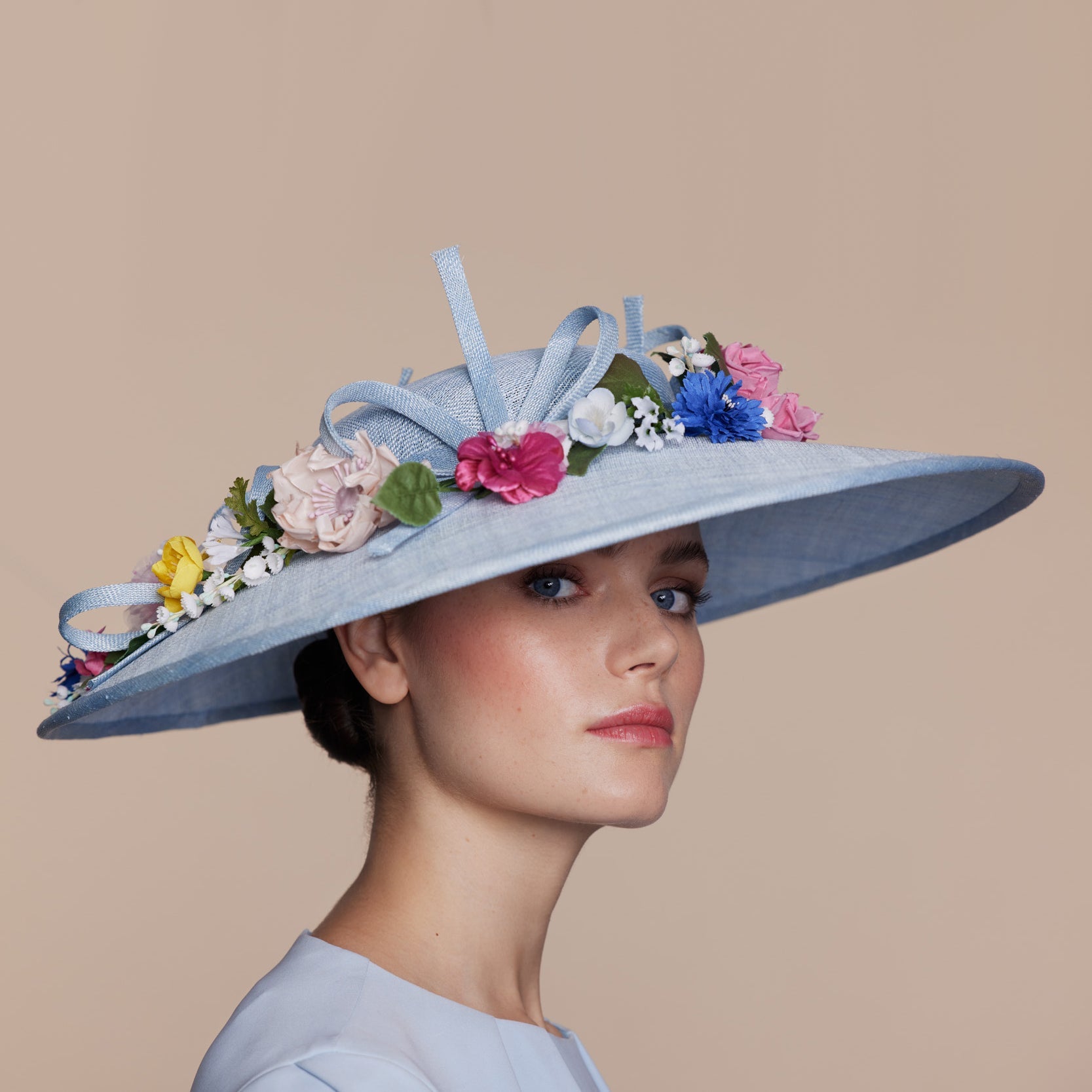 Pale blue fine straw bell with multi-colour flowers