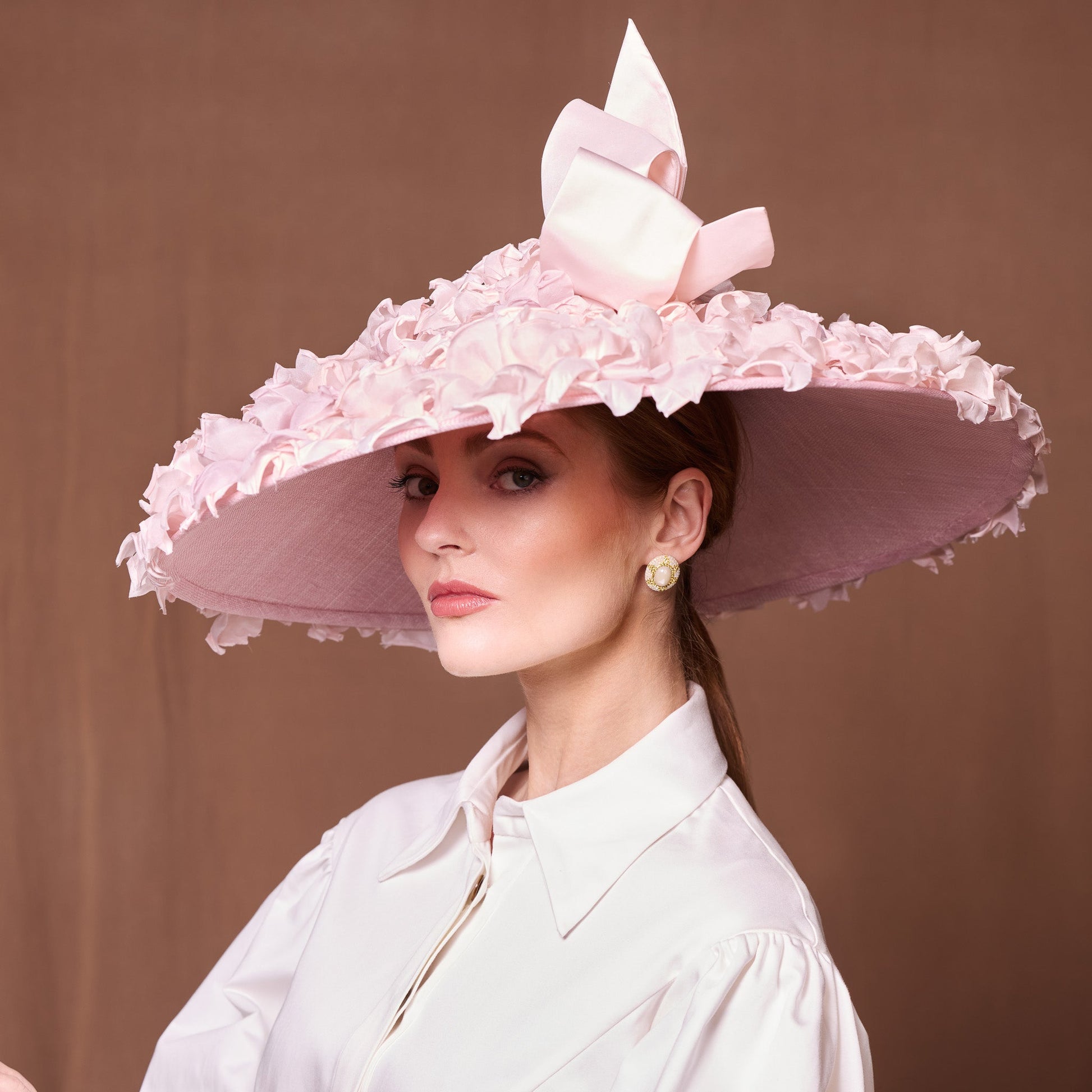 Pale pink silk petal shallow downbrim with bow