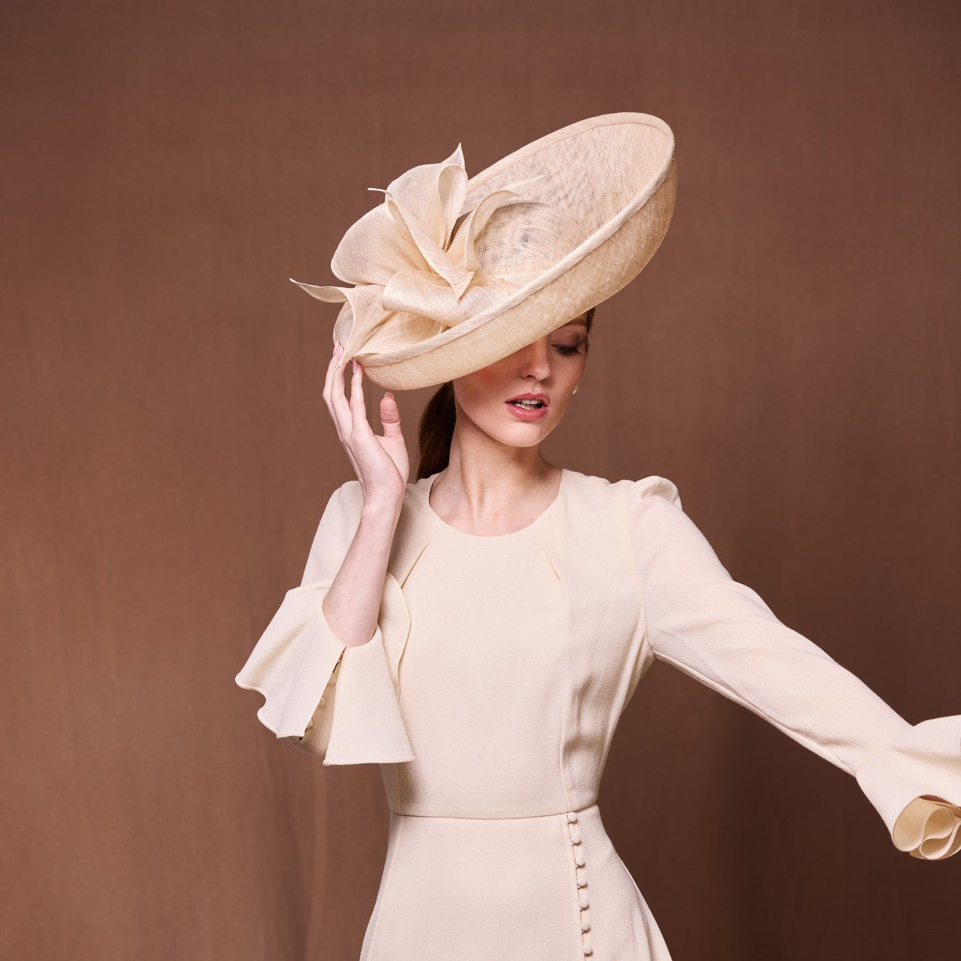 Natural fine straw sidesweep with rolled bows