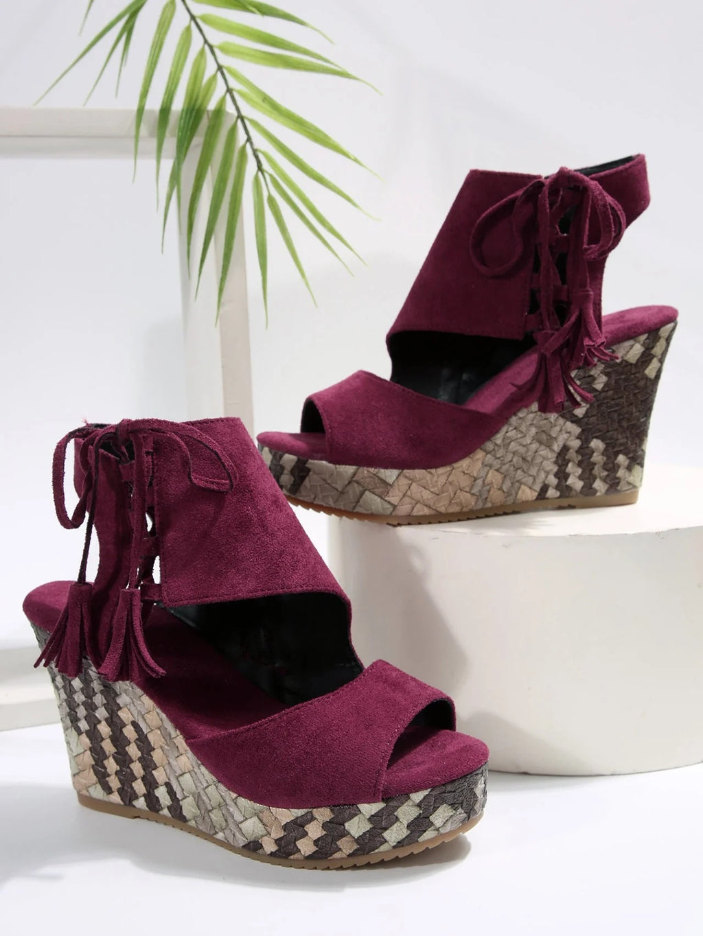 Peep-tpe wedge sandals with tassels