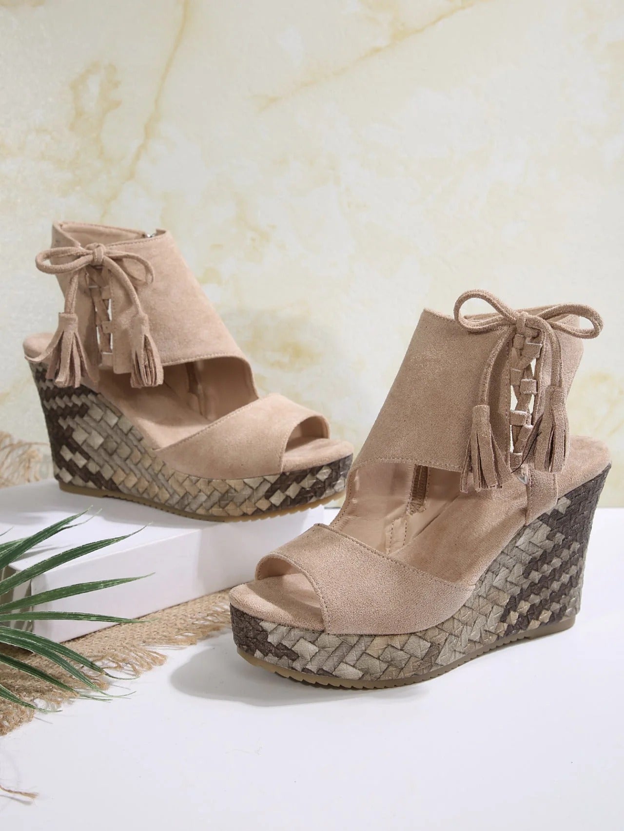 Peep-tpe wedge sandals with tassels