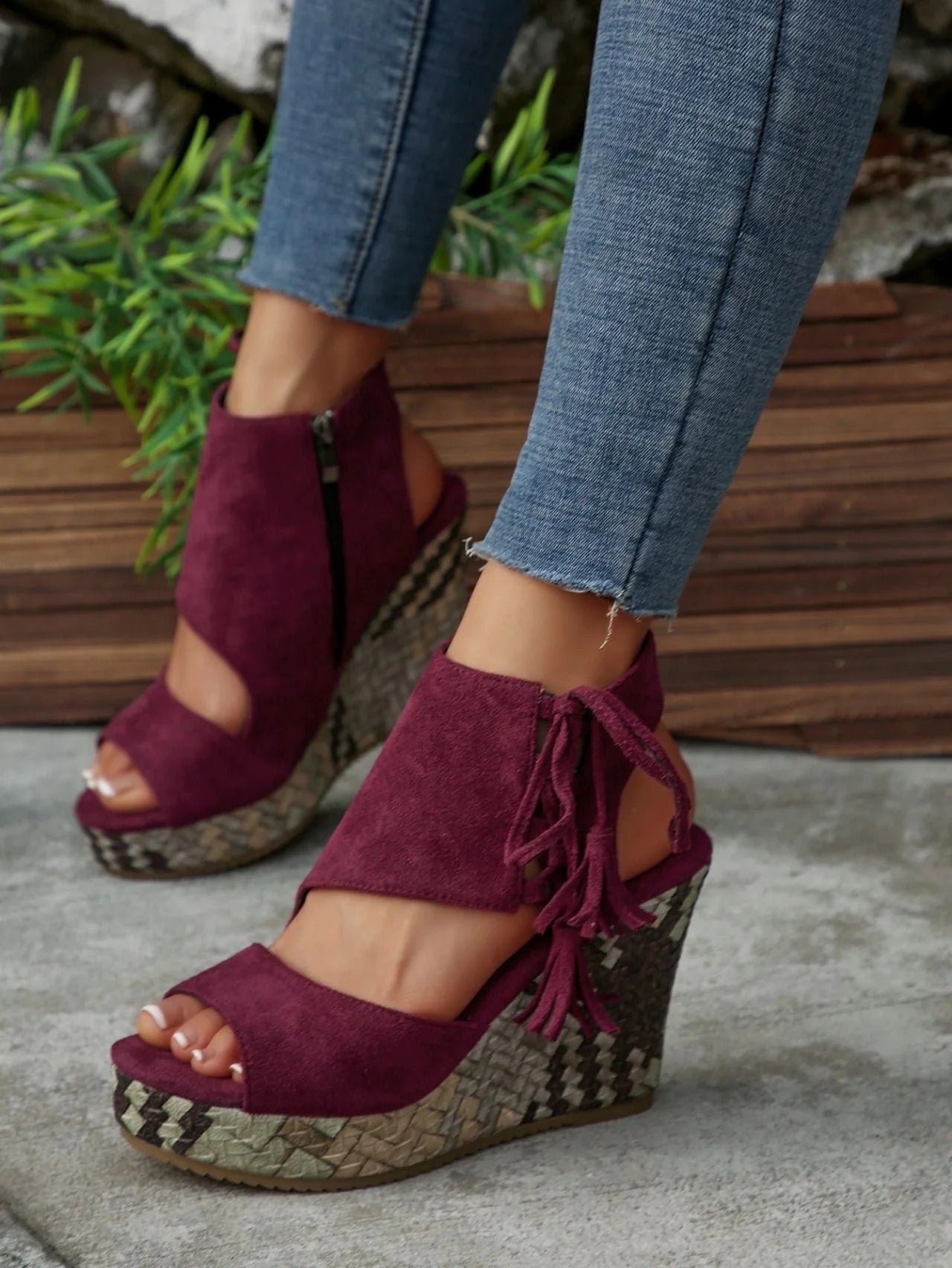 Peep-tpe wedge sandals with tassels